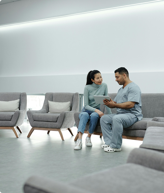 clinician talking to a patient in a calm office